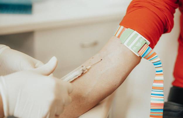 Woman in hospital for blood collection. Blood tests for the disease in the laboratory