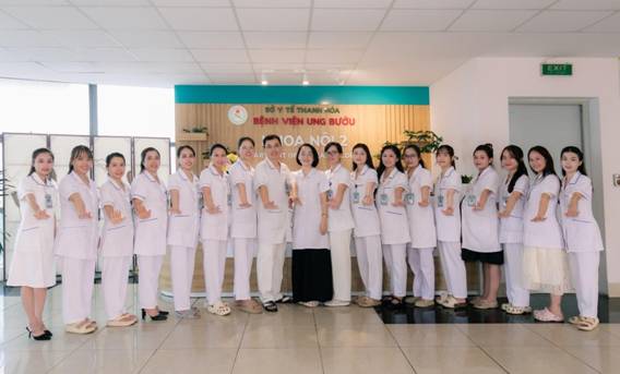 A group of women in white uniforms

Description automatically generated